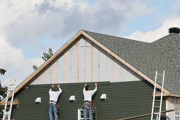 Professional Storm Damage Siding Repair technician working in Milton, WV